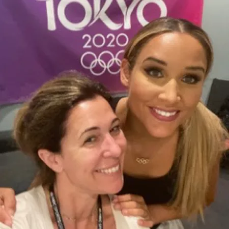 Two women smiling at Tokyo 2020 Olympics.
